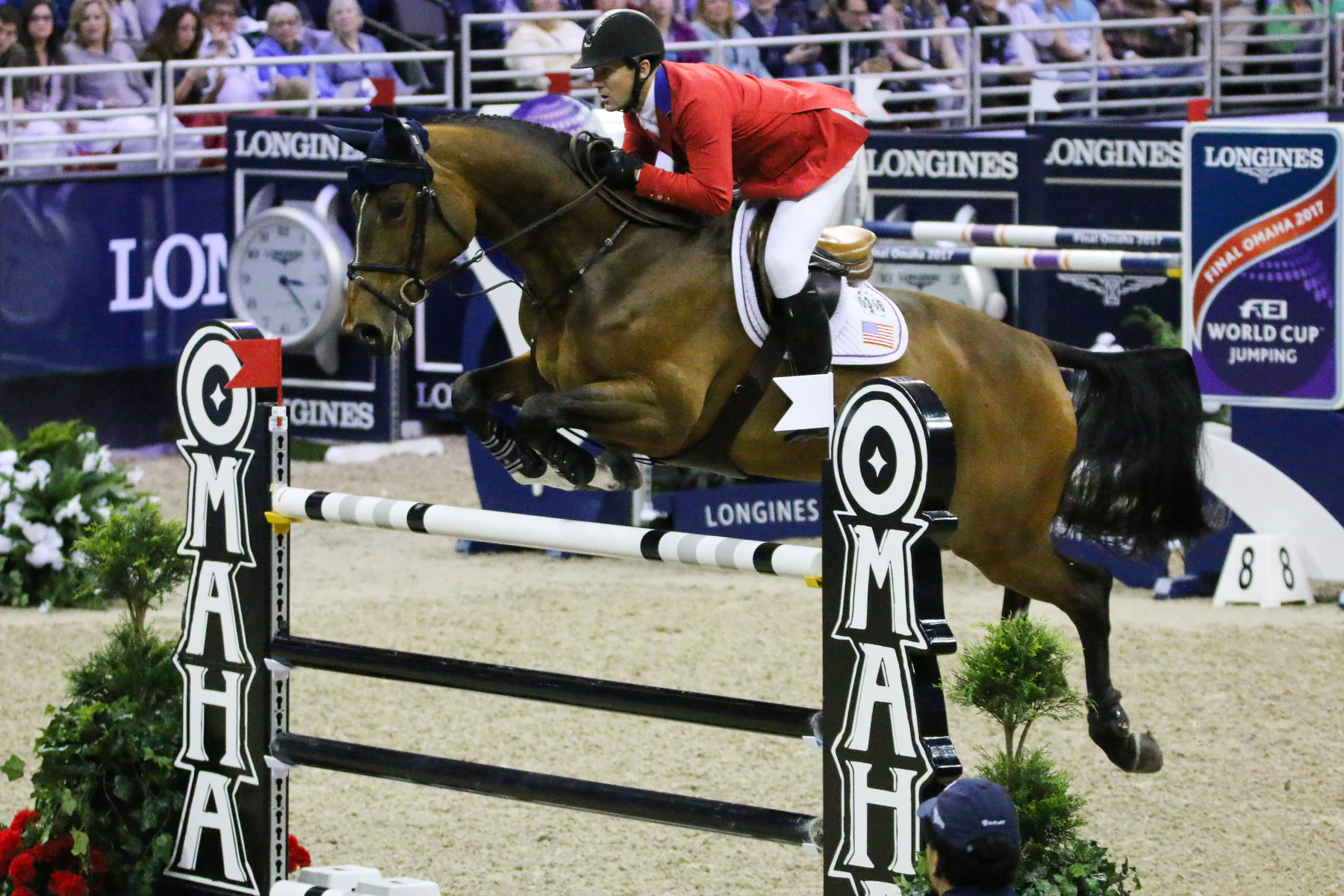 McLain Ward riding the bay mare HH Azur over a fence at the 2017 FEI World Cup Jumping Final in Omaha.